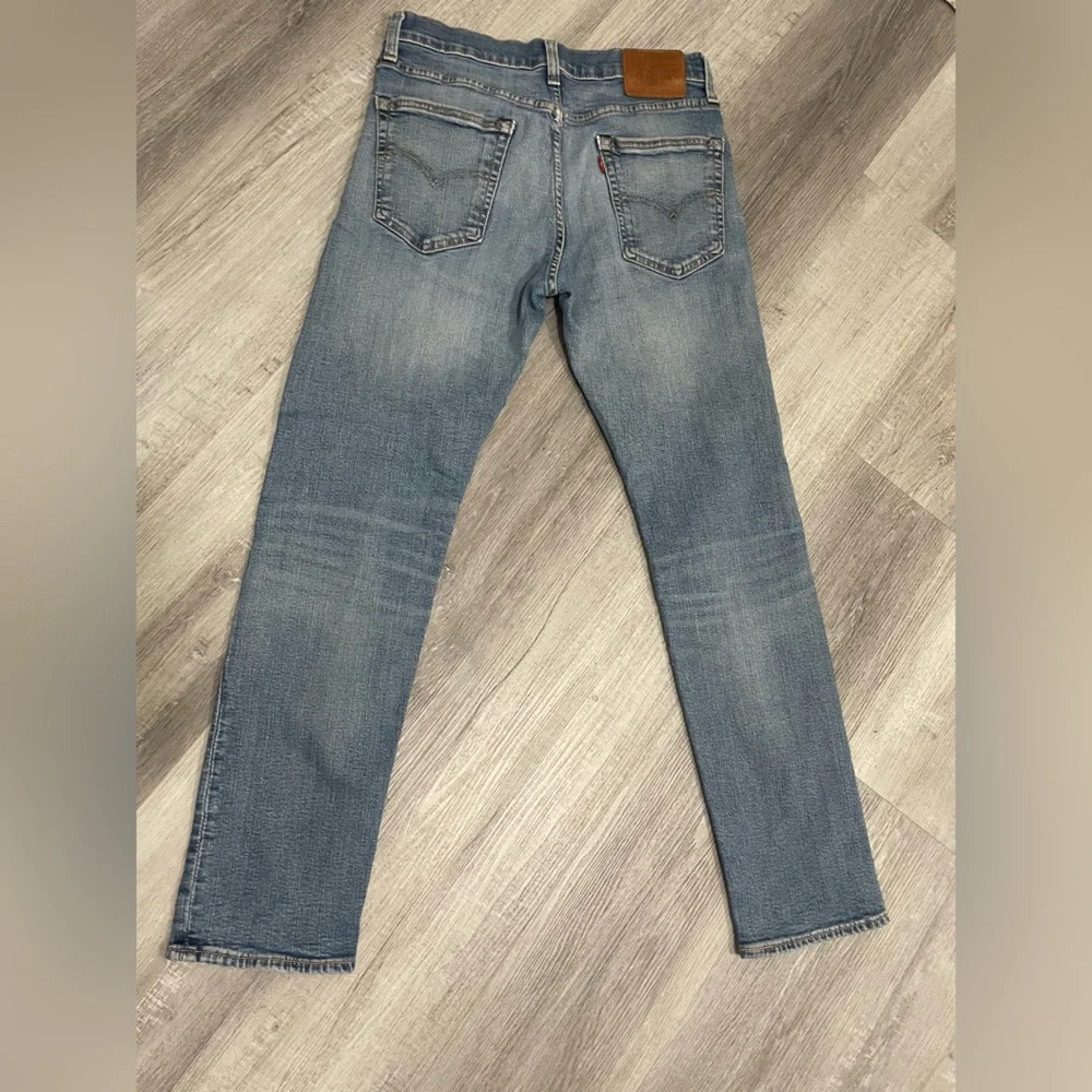 Levi's 502👖Men Premium Taper Fit Jeans with Vintage-Inspired Fading,size 31x32